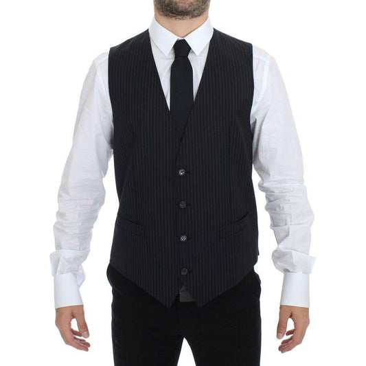 Dolce & Gabbana gray dress vest worn by a man, featuring a single breasted design and adjustable back strap.