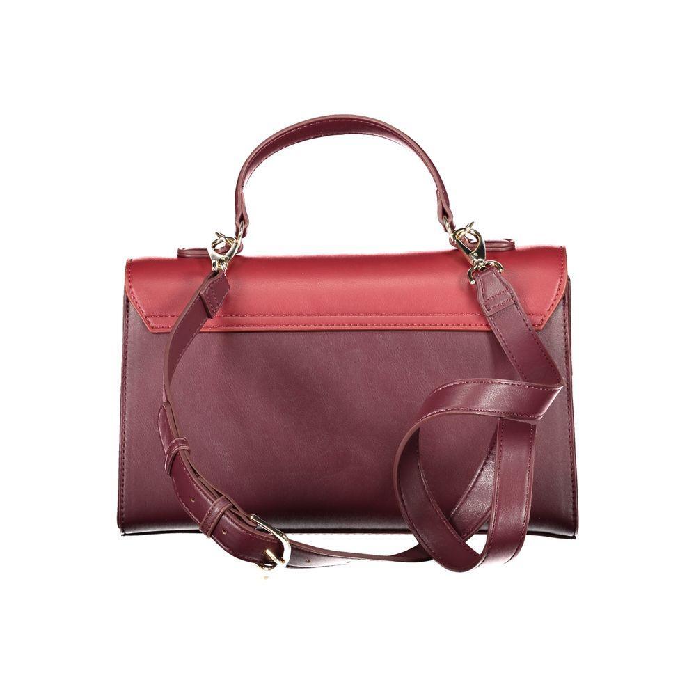 Front view with bag zipped and handles upright.